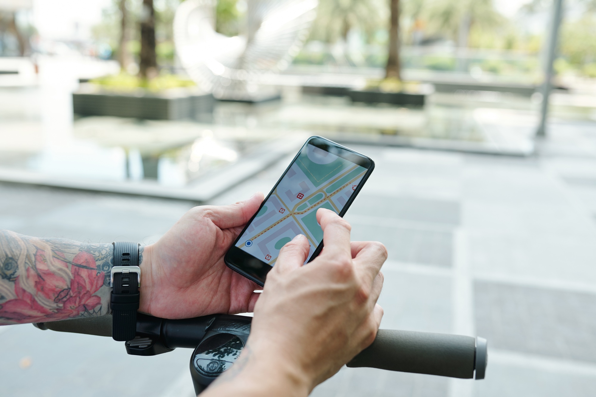 Man checking map on smartphone
